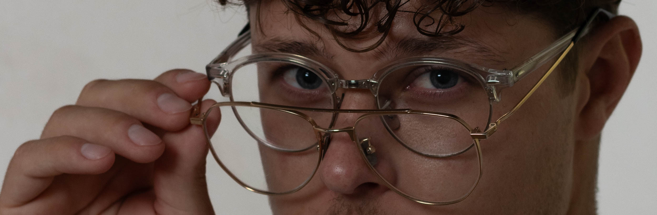 A man wearing two glasses